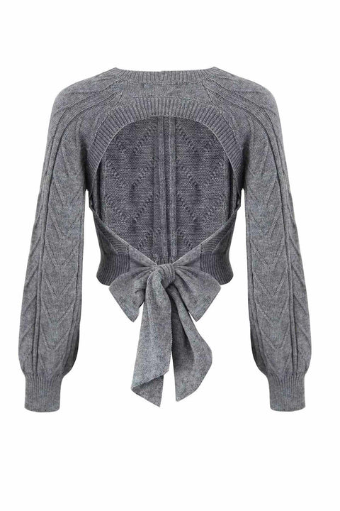 OPEN BACK JUMPER WITH A BOW