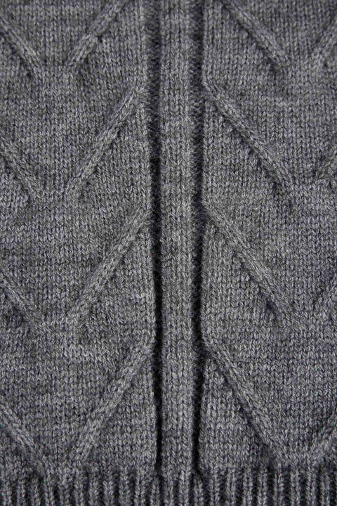 OPEN BACK JUMPER WITH A BOW
