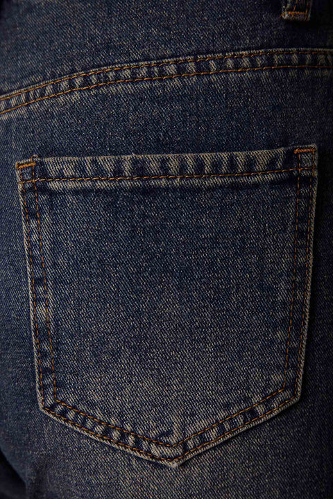 FLARE JEANS WITH A FADED EFFECT