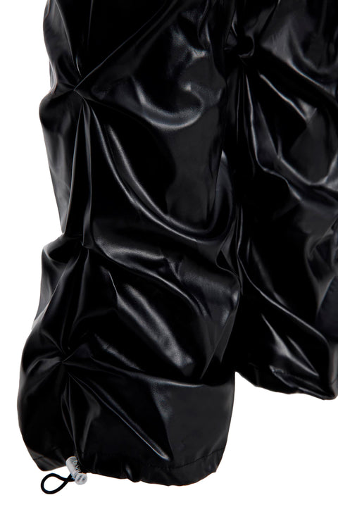 DRAPED VEGAN LEATHER TROUSERS